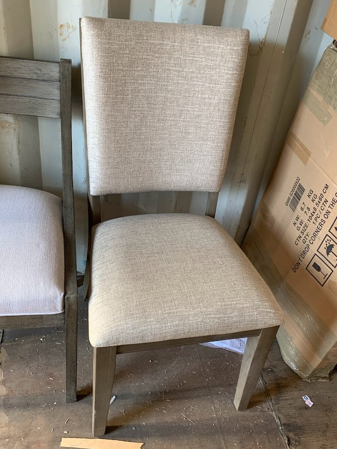 Set of dining chair with intricate back.